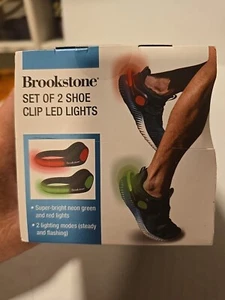 Brookstone Juego de 2 Luces LED con Clip para Zapatos Nuevo en Caja Luces Verde Neón y Rojo - Imagen 1 de 4