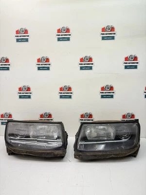 Juego de faros Nissan 300ZX Z32 1990-1996 par dañado OEM Foto 1 de 4