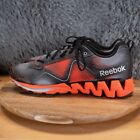 Rozmiar 13 - Reebok Męskie buty do biegania Zig Kick Trail M44205 Czarne Pomarańczowe
