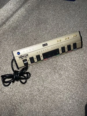 TrippLite HTPowerBar10 Surge Protector 10 Outlets Phone Fax Modem Cable In/Out - Image 1 of 4