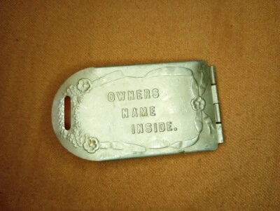 ---Antique hinged aluminum luggage tag “Owners Name Inside” - Image 1 of 4