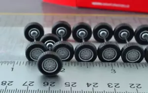 Herpa 052931 8X Single Wheel Sets Tire + Rims + Axles for Trucks 1:87 HO - Picture 1 of 5
