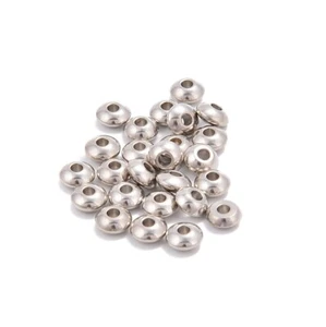 Distanziali dischi tondi foro acciaio inox 304 2,0 mm perline 3x6 mm 50 pezzi per sacchetto - Foto 1 di 2