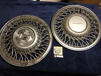 "Dos tapacubos Plymouth Grand Voyager 15"" radios cable 1992 1993 1994 1995" Foto 1 de 4