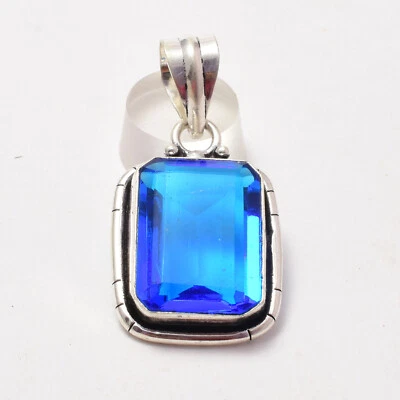 Colgante hecho a mano de plata de ley 925 con piedras preciosas de topacio azul Foto 1 de 4