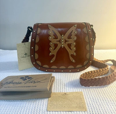 Bolso de montar de cuero Patricia Nash Salerno Western Lux mariposa precio de venta sugerido por el fabricante $229 nuevo con etiquetas Foto 1 de 4