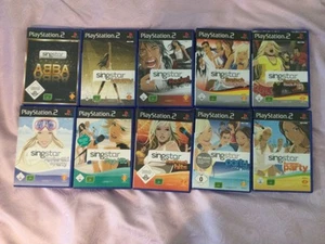 PS 2 Singstar Bundle mit 2 Mikrofone rot/blau+USB Adapter und 10 Spielen - Bild 1 von 5
