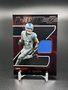 2024 Panini Zenith #ZJ-26 AMON-RA ST. BROWN 'Z-JERSEY' JERSEY Patch Mem LIONS - Picture 1 of 2