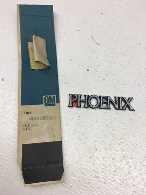 GM NOS 1980-84 Pontiac Phoenix guardabarros emblema 10000410 Foto 1 de 4
