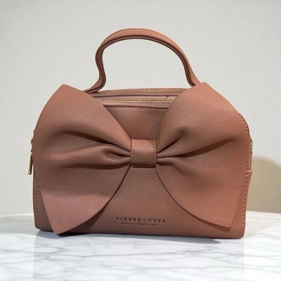 Bolsa de mão decorativa de couro rosa macio com zíper elegante elegante elegante - Imagem 1 de 4