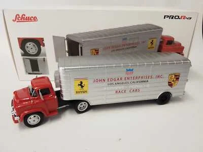 Schuco GMC Renntransporter John Edgar Enterprises Ferrari Porsche 1/43 450913400 - Immagine 1 di 2