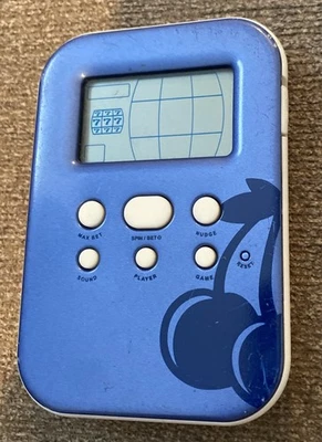 Radica Pantalla Iluminada Ranuras Electrónico Portátil Juego 2008 Probado y Funciona Foto 1 de 4