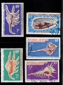 NEW CALEDONIA #370, 374-75 USED, #395-96 MINT LH (SEASHELLS) - Picture 1 of 1