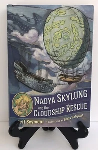 Nadya Skylung & Masked Kidnapper and The Cloudship Rescue Hardcover Book New - Picture 1 of 4
