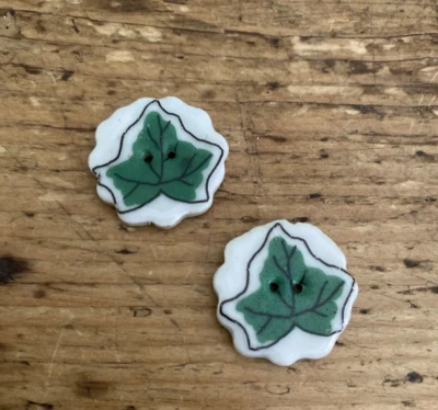 VINTAGE Ceramic Green Variegated Ivy Leaf 2 Hole Buttons Hand Painted Set of 2 - Image 1 of 4