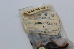 HONDA OEM GENUINE CONTACT POINTS PART # 31010-PC2-661 MADE IN JAPAN NOS - Picture 1 of 4