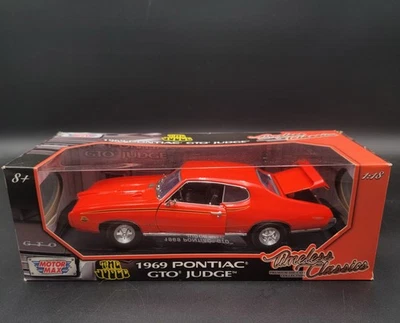 1:18 MOTORMAX TIMELESS CLASSICS 1969 PONTIAC GTO JUDGE DIECAST ORANGE - Image 1 of 4