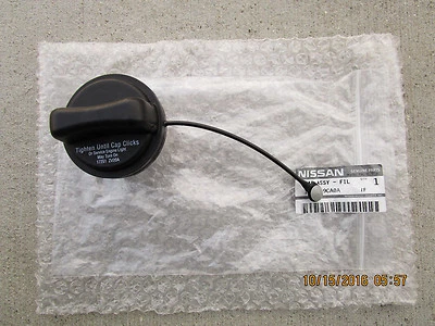 06-10 NISSAN FRONTIER LE SE XE S SV SL FUEL GAS TANK FILLER CAP TETHER NEW 9CA0A - Image 1 of 4