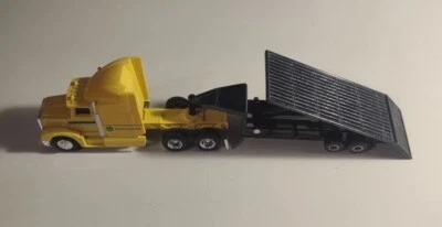 Ertl John Deere Yellow Truck Semi 18 Wheeler Truck w/ Black Trailer Collectible - Image 1 of 4