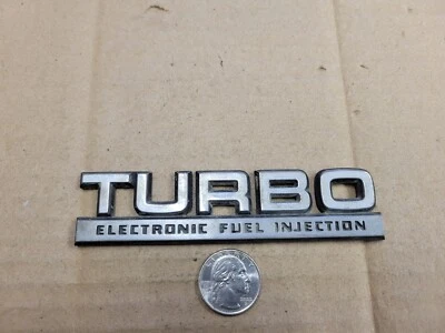 Chrysler OEM 1984-1991 LeBaron Turbo Electrónico Inyección de Combustible Emblema Insignia Logo Foto 1 de 2