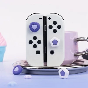 Tapas de agarre GeekShare ThumbStick para Nintendo Switch/OLED/Lite Wing Star Dark 4 piezas - Imagen 1 de 12