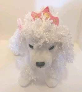 Peluche Aurora Poodle blanco con lazos rosas y tierra 6 pulgadas - Imagen 1 de 8