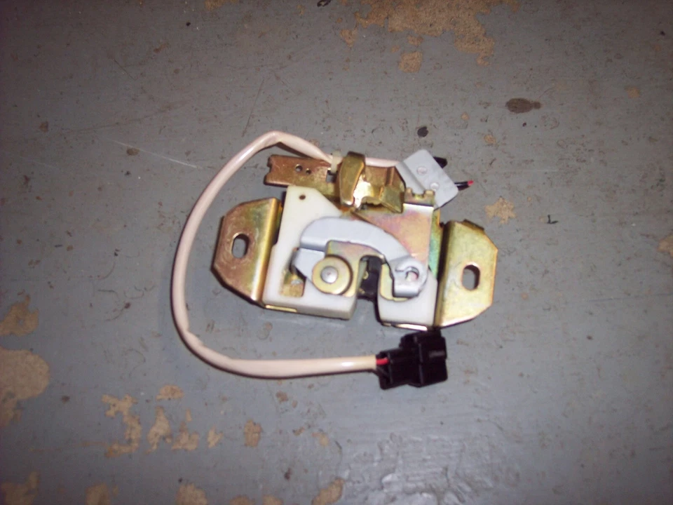 97 Eagle Talon Turbo Trunk Latch Lock Striker OEM pop - Image 1 of 4