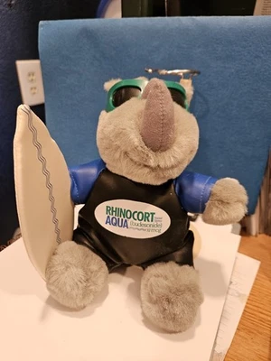 RhinoCort Aqua Nasal Spray Advertisement Surfer  Plush Rhinoceros 8” - Image 1 of 4