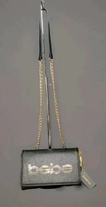 GORGEOUS - bebe-BLACK SAFFIANO WITH GOLD PERFORATED LOGO CROSSBODY BAG - Picture 1 of 21