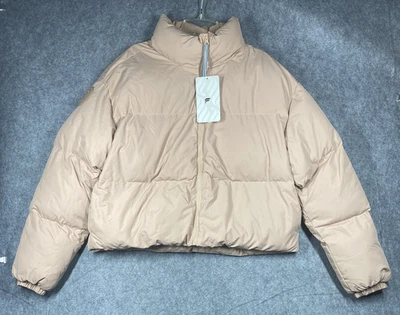 Chaqueta acolchada recortada Fabletics Wander para mujer pequeña cálida reciclada aislada Foto 1 de 4