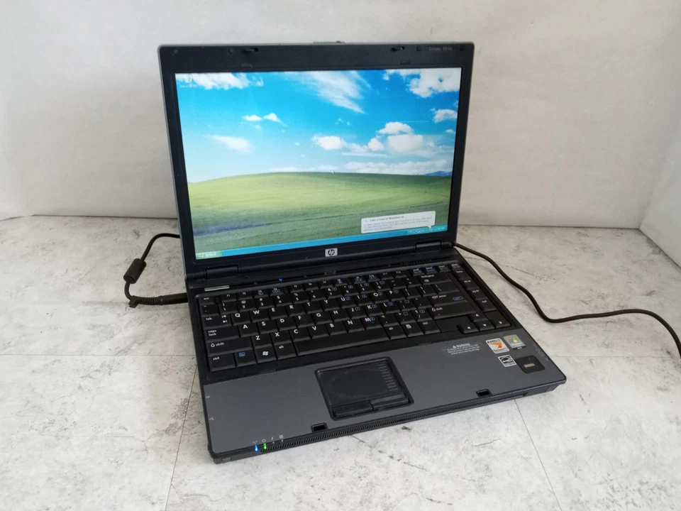 HP Compaq 6515b 14.1" Laptop AMD Turion X2 4GB RAM 80GB HDD XP - NO BATTERY -RR - Image 1 of 4