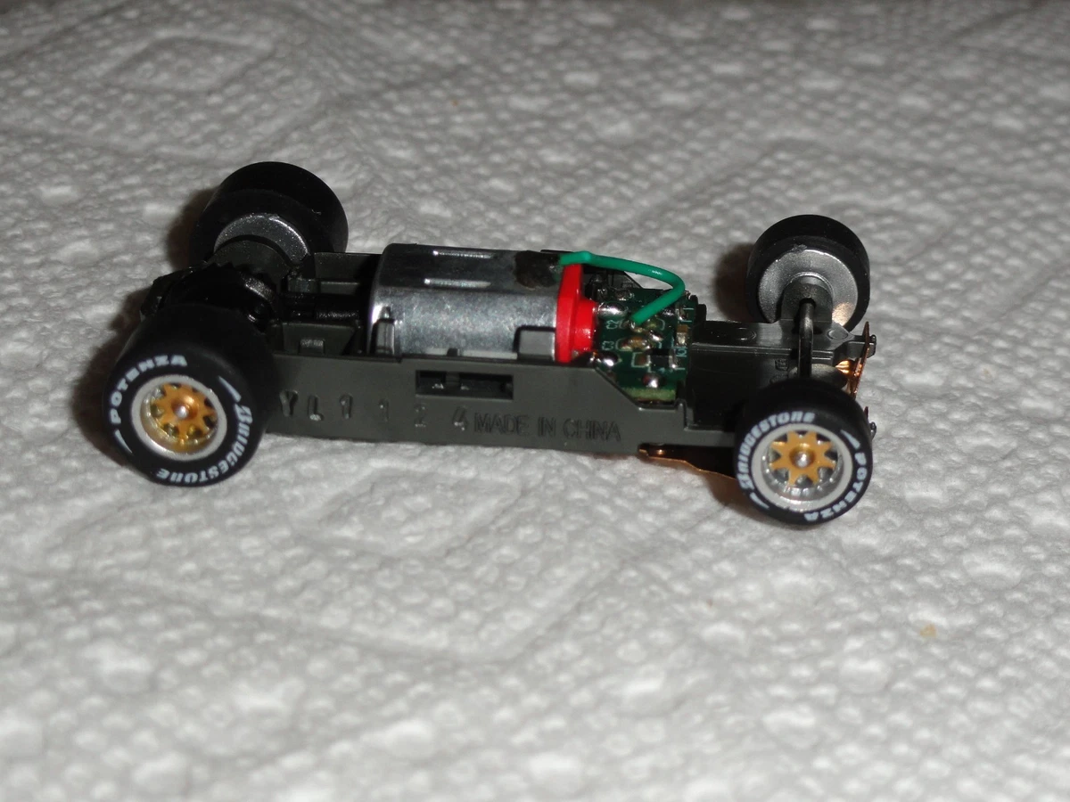 12-Pack AFX Aurora 4-Gear Large Drag Tires For HO Slot Cars – Soft Black Compound (#8742)