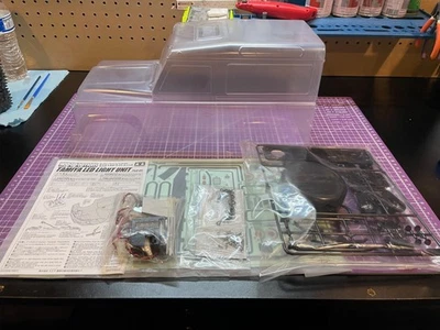 TAMIYA 1990 DEFENDER 90 BODY PARTS SET WITH LEDS TAM51607 FOR CC01 CC02 - Image 1 of 2