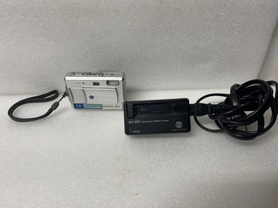 Konica Minolta Dimage X50 5.0 MP Digital Camera Silver w/ Charger TESTED - Image 1 of 4