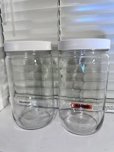 Lote de 2 botellas de vidrio transparente boca regular 32 fl. oz con tapas blancas atornilladas - Imagen 1 de 9
