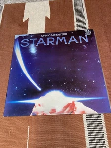 STARMAN SOUNDTRACK LP - JOHN CARPENTER - JACK NITZSCHE - UK TER PRESS 1984 VG+ - Imagen 1 de 3