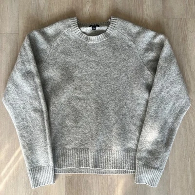 Suéter de lana Uniqlo para mujer talla grande gris cuello redondo elástico 100% lana preppy costera Foto 1 de 4