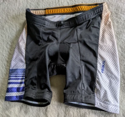 Shorts de ciclismo acolchoado feminino PRIMAL preto dourado azul branco bicicleta - Imagem 1 de 4