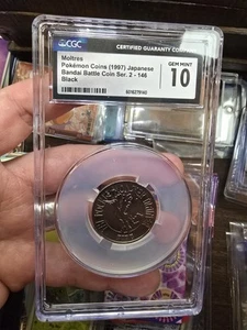 Moltres Pokémon Rare Vintage '97 Bandai Battle Coin Metal Japanese Black - CCG 10 - Bild 1 von 3