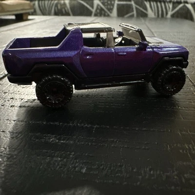 Hot Wheels GMC Hummer EV HEV Púrpura Pickup HW Verde Velocidad Foto 1 de 3