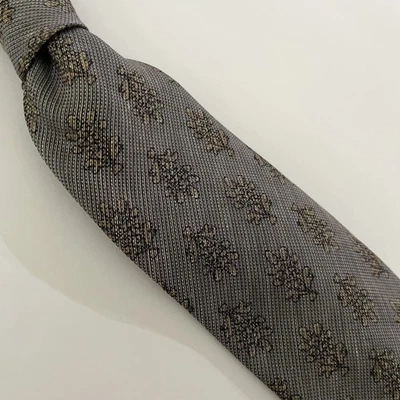 CORBATA XMI PLATINO 100% SEDA GRIS LIGERAMENTE TEXTURIZADO con FLORA DORADO-BRONCEADO Foto 1 de 4