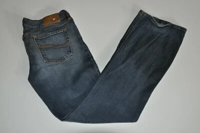 Pantalones de mezclilla TILT para mujer largos lavados medios tiro bajo calce regular corte bota elásticos 11 largos Foto 1 de 4