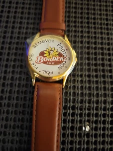 Reloj Publicitario Borden Dairy Elsie The Cow Correa Protectora de Cuero Sin Usar - Imagen 1 de 4