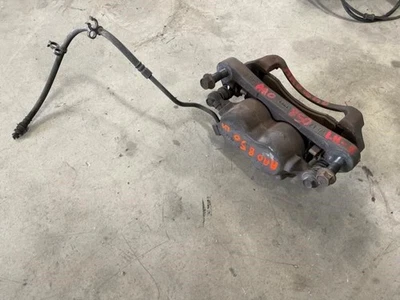 99-04 Ford F250 Super Duty USED LH Left Front Caliper w Bracket Assembly - Image 1 of 4