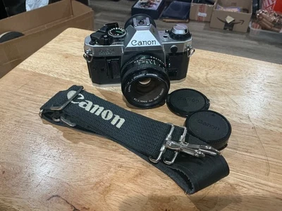 Cámara fotográfica Canon AE-1 Program 35 mm SLR con lente FD de 50 mm Foto 1 de 4