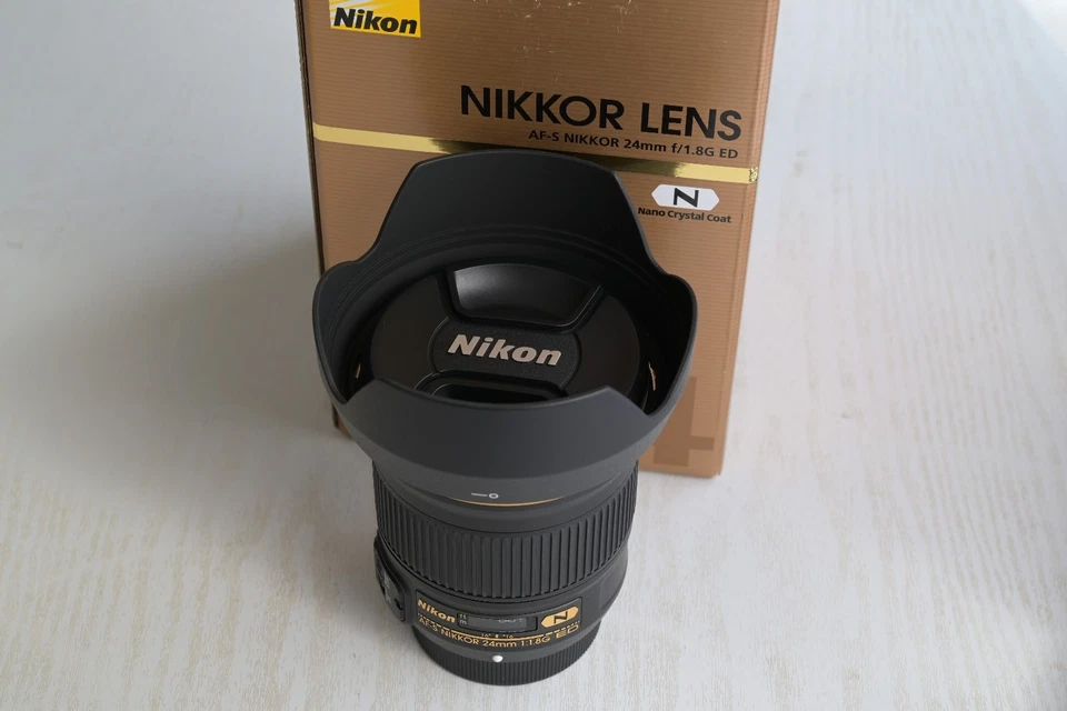 Nikkon AF-S 24mm f/1.8G ED Lens - Virtually unused - Image 1 of 4