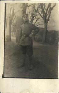 WWI German soldier standing outside long bayonet ~ RPPC real photo 1915