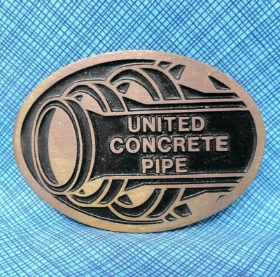 Hebilla de cinturón United Concrete Pipe latón macizo vintage años 80 90 DynaBuckle .DBD397 Foto 1 de 4