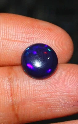 Piedra preciosa de ópalo redonda 2,40 quilates cabujón ópalo negro fuego azul etíope 11x11x4 mm Foto 1 de 3