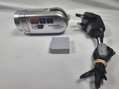 Samsung SMX-F300SP/XEU Camcorder – Silver – Battery, Strap – VGC Works - Image 1 of 4
